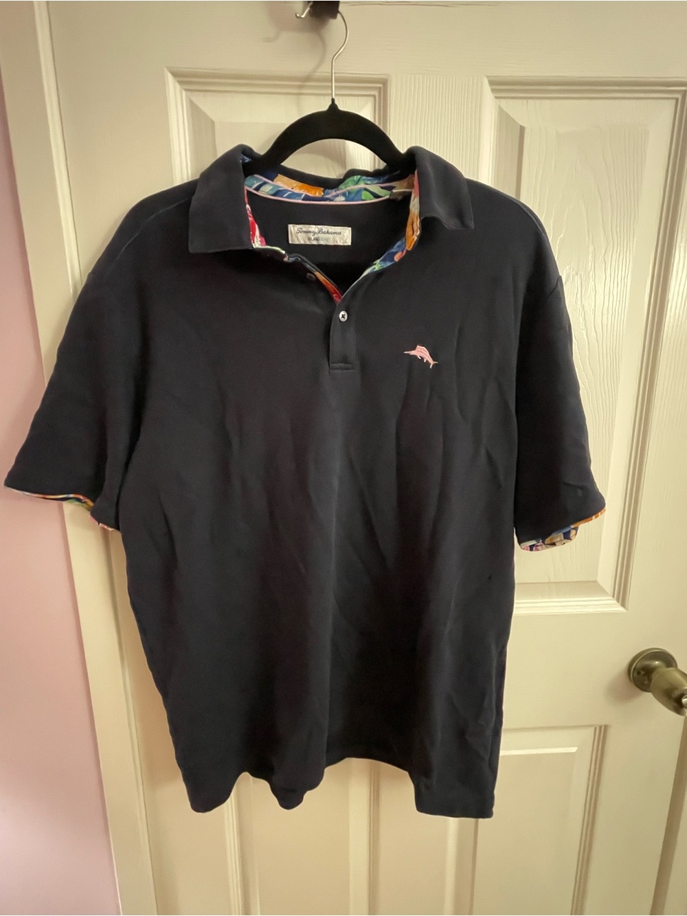 Tommy Bahama Navy Polo with Pink Dolphin Accent